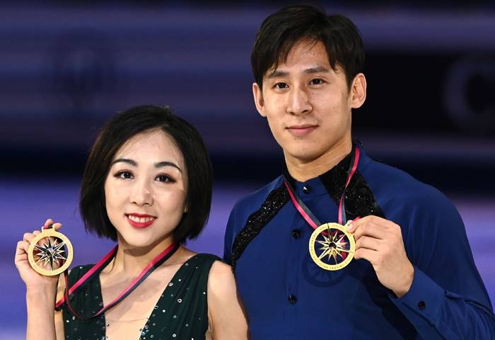 Winners China's Wenjing Sui and Cong Han pose with gold medals after the Pairs Free Skating program at the ISU Grand Prix of figure skating Final 2019 in Turin, on Friday. — AFP