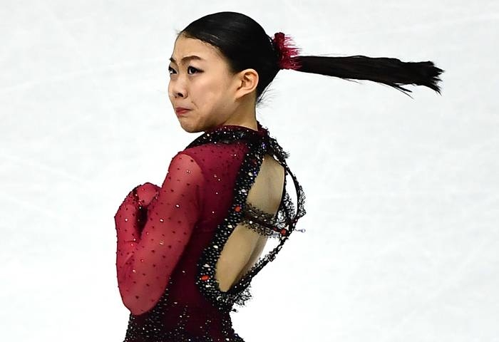 Winners China's Wenjing Sui and Cong Han pose with gold medals after the Pairs Free Skating program at the ISU Grand Prix of figure skating Final 2019 in Turin, on Friday. — AFP