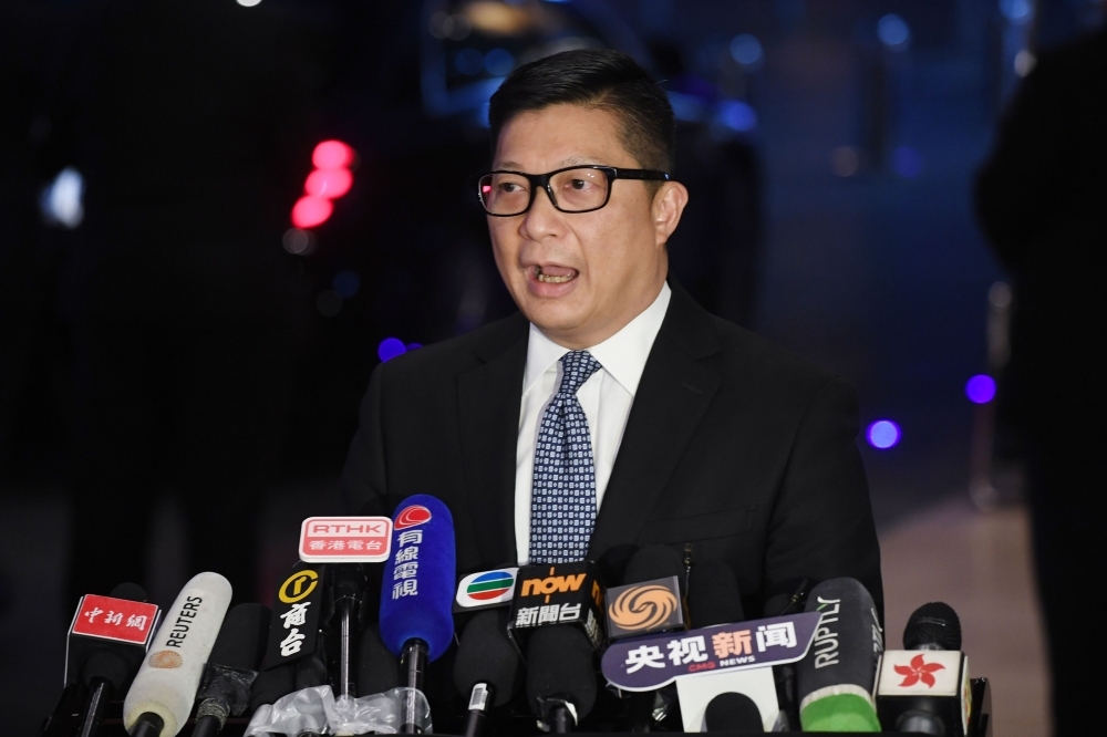 Hong Kong police chief Tang Ping-keung speaks to media after meetings with Chinese officials in Beijing on Saturday. -AFP