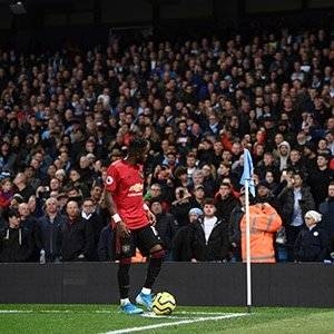 Fred of Manchester United looks to the crowd as missiles are thrown form the stands during the Premier League match between Manchester City and Manchester United at Etihad Stadium on Saturday in Manchester, United Kingdom. — AFP