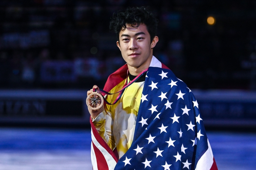 Winner USA's Nathan Chen poses with his medal and the US flag after the Men Free Skating program at the ISU Grand Prix of figure skating Final 2019 in Turin, on Saturday. — AFP