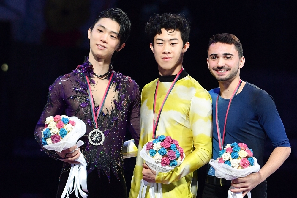 Winner USA's Nathan Chen poses with his medal and the US flag after the Men Free Skating program at the ISU Grand Prix of figure skating Final 2019 in Turin, on Saturday. — AFP