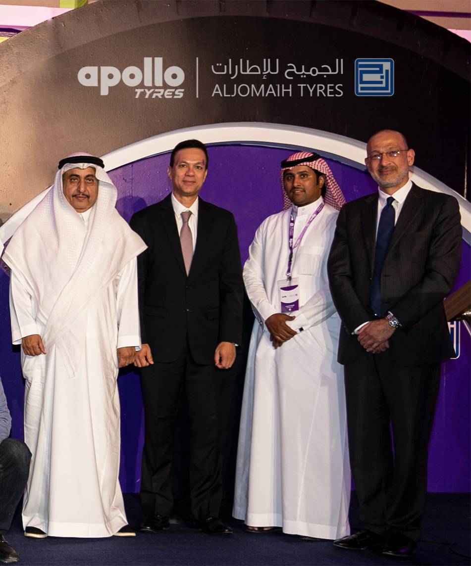 Top executives of signatory companies pose for a group photo