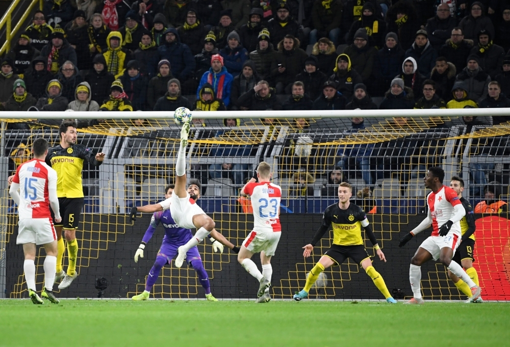 Slavia Prague's Bahrain forward Abdulla Yusuf Helal kicks the ball during the UEFA Champions League Group F football match between Borussia Dortmund and SK Slavia Prague in Dortmund, western Germany, on Tuesday. — AFP