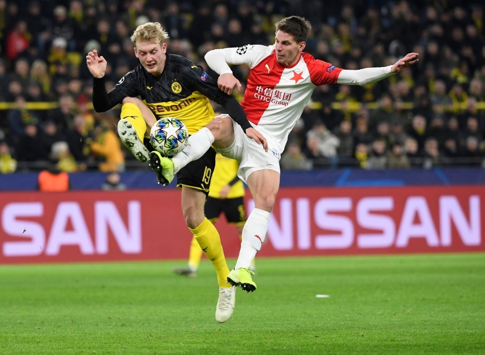 Slavia Prague's Bahrain forward Abdulla Yusuf Helal kicks the ball during the UEFA Champions League Group F football match between Borussia Dortmund and SK Slavia Prague in Dortmund, western Germany, on Tuesday. — AFP