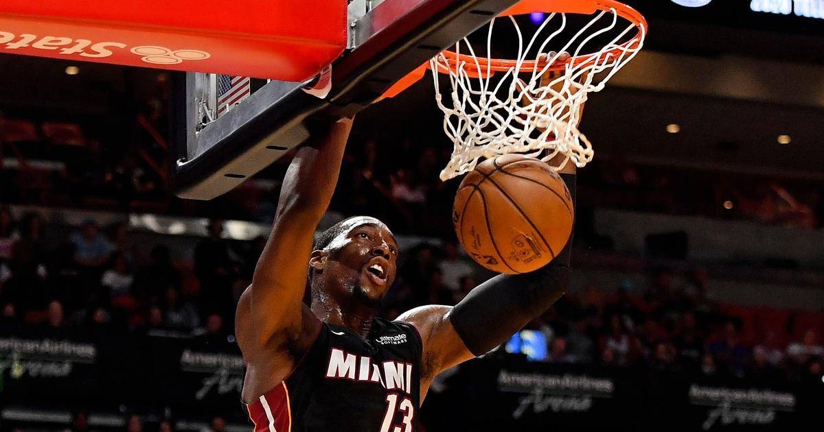 Miami Heat center Bam Adebayo (13) dunks the ball. — Courtesy photo