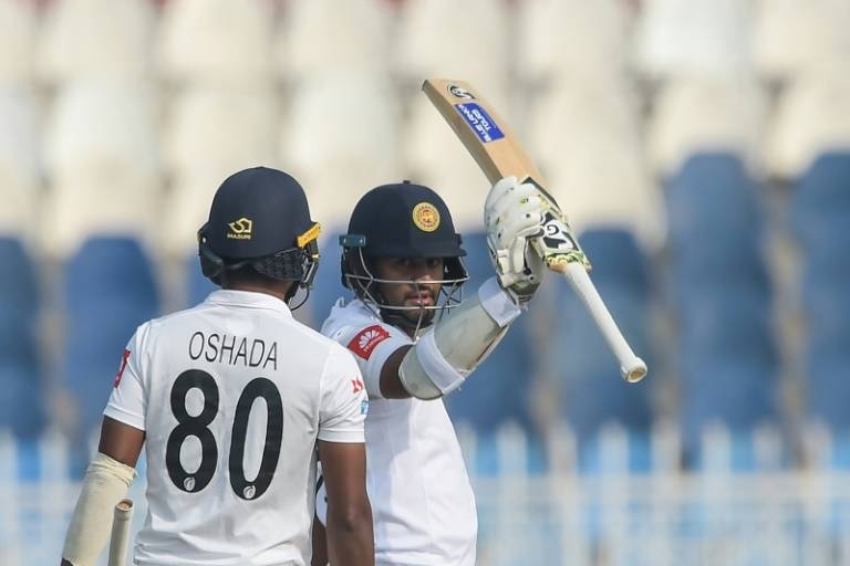Sri Lanka's Dimuth Karunaratne scored a half-century on the first day. — AFP