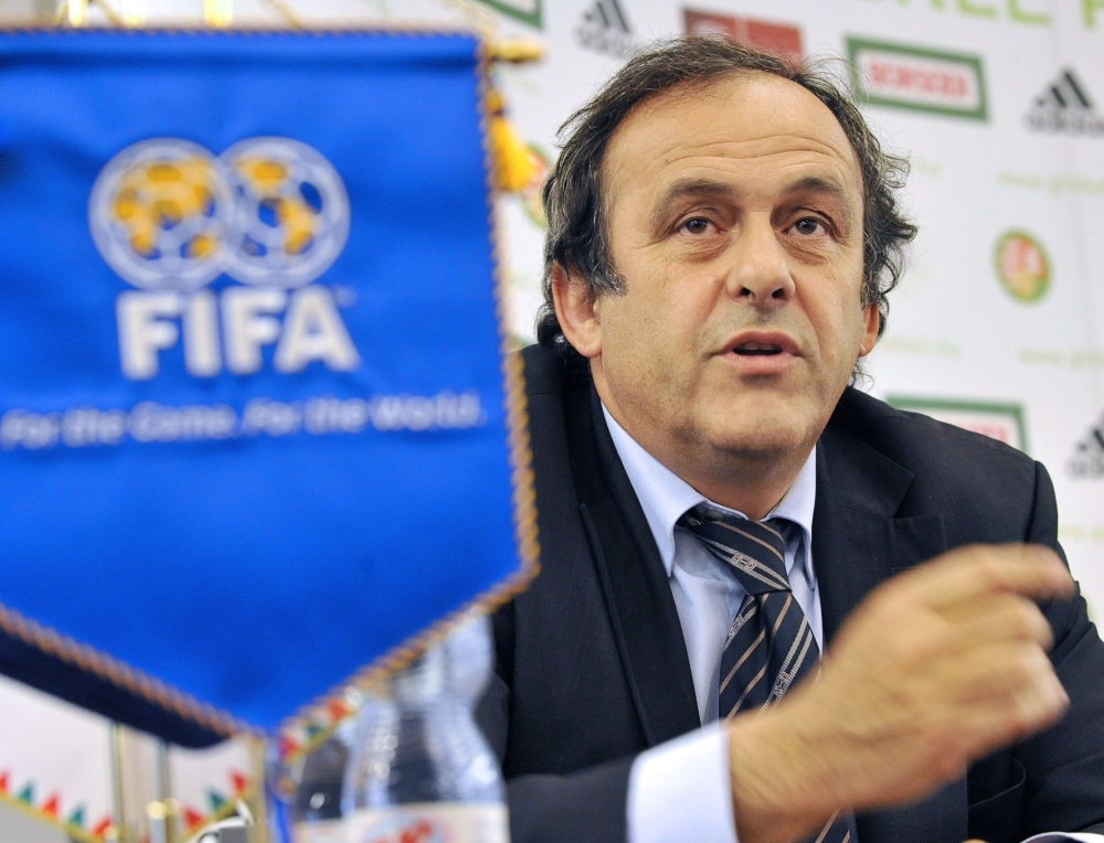 This file photo taken on May 2, 2009 shows former UEFA president Michel Platini looking on during an inauguration ceremony of the 'Technical and Training Center of the Hungarian Football Federation' in Telki, some 30 km northwest from Hungarian capital. FIFA is to take legal action by the end of the year to force Michel Platini to return 2 million Swiss francs ($2 million) he received 