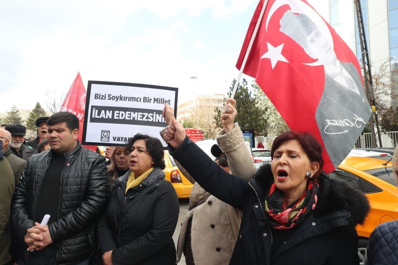 People demonstrate outside the US embassy, on Friday in Ankara, one day after US congress  formally recognized the 1915-1917 murder of up to 1.5 million Armenians as genocide. — AFP