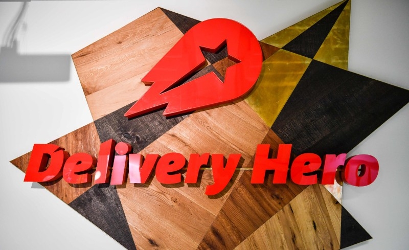 A logo is seen in a lounge area of the global headquarters of online food ordering and delivery giant Delivery Hero in Berlin in this June 27, 2017 file photo. — AFP