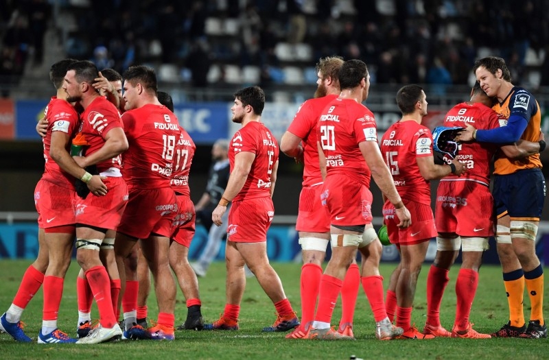 Toulouse's players celebrate after winning the European Rugby Champions Cup rugby union match between Montpellier and Toulouse on Saturday, at the GGL stadium in Montpellier, southern France.  — AFP