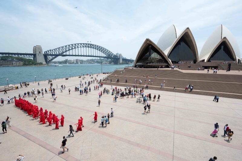 The Red Rebels, part of the Extinction Rebellion Australia demonstrator group, participate in a climate protest rally in Sydney on Sunday. -AFP