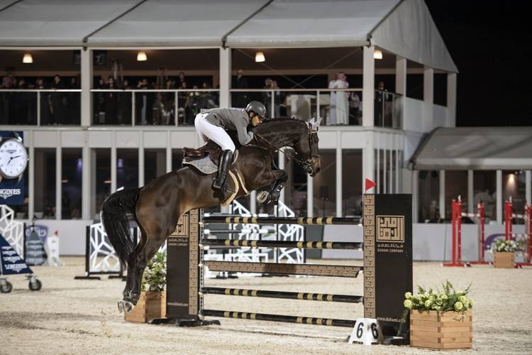 Saudi rider Abdulrahman Alrajhi performing Saudi A'rdha dance.