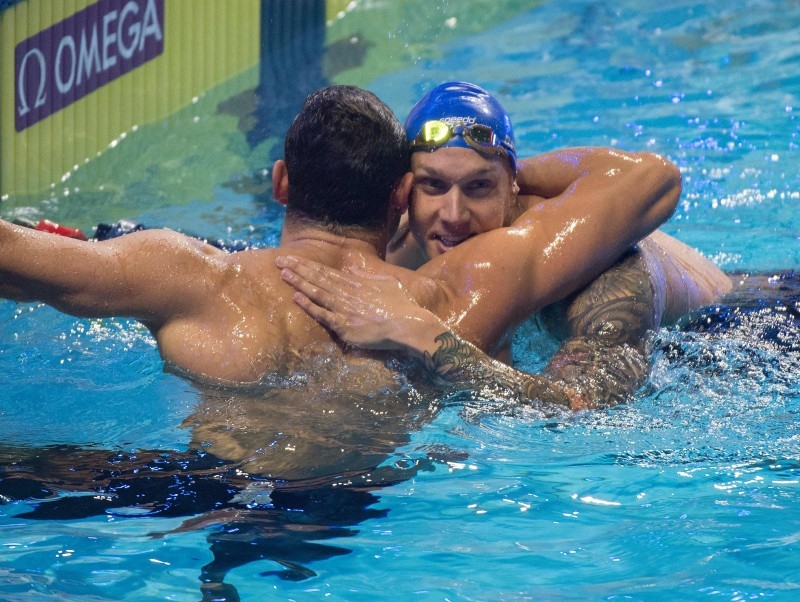 Caeleb Dressel of the US (R) from the Energy Standard team celebrates with second place Florent Manaudou of France, after winning the Men's 50m Freestyle during the International Swimming League (ISL) Championship Finale at the Mandalay Bay Hotel in Las Vegas, Nevada on Friday. — AFP