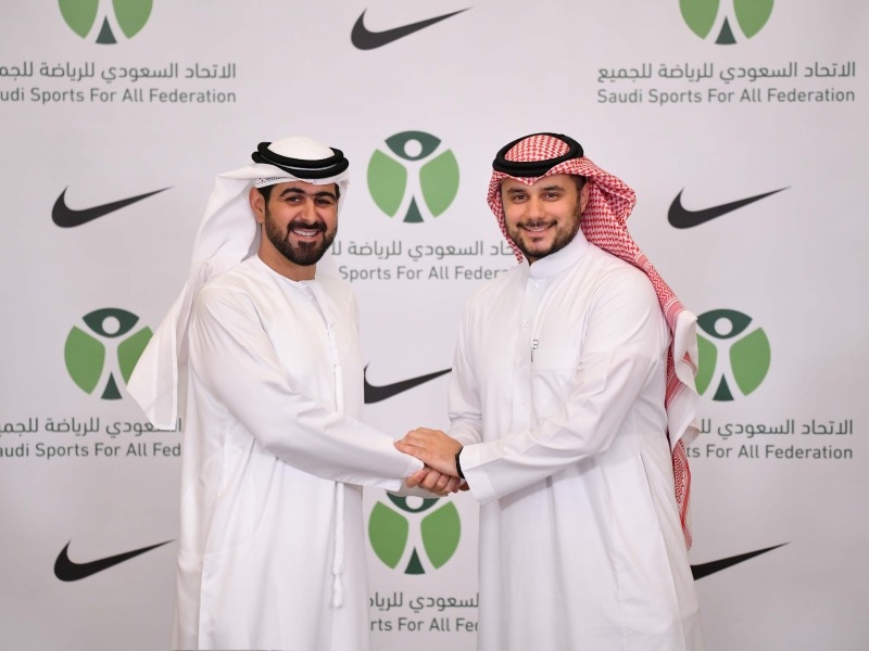 Saudi Sports for All Federation President Prince Khaled Bin Alwaleed, right, is seen during the signing of the Memorandum of Understanding with Nike. — SG