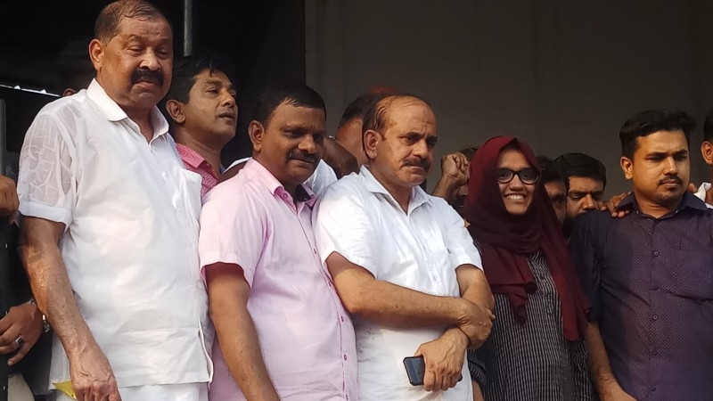 Aysha Renna with her father Abdul Rasheed and mother Qamarunnisa at their home in Kaloth, near Kondotty, when she visited them during the Christmas vacation.