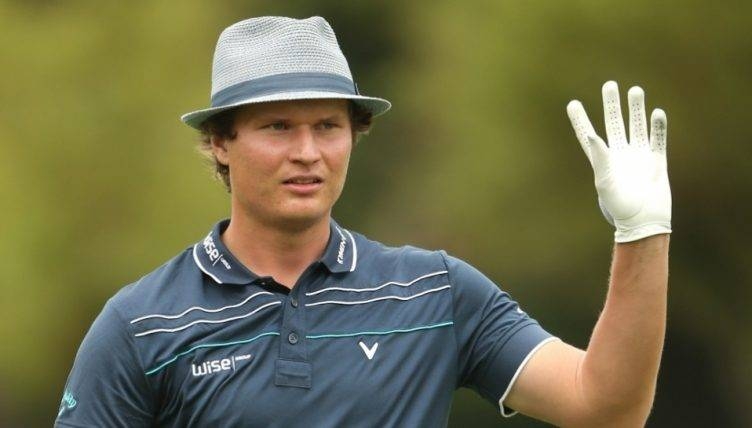 Finn Tapio Pulkkanen, known as 'The Hat' because of his unusual golf headwear, held a one-shot South African Open second-round lead Friday after a five-birdie 66 in Johannesburg.