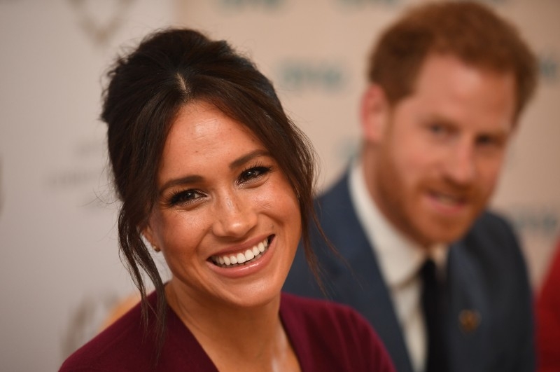 Britain's Prince Harry, Duke of Sussex, right, and Meghan, Duchess of Sussex attend a round-table discussion on gender equality with The Queen’s Commonwealth Trust (QCT) and One Young World at Windsor Castle in Windsor in this Oct. 25, 2019 file photo. — AFP