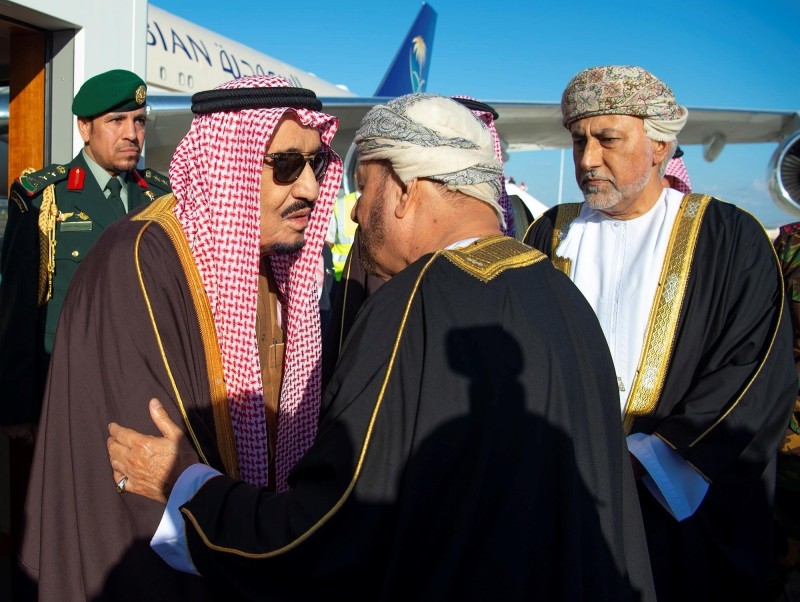 Custodian of the Two Holy Mosques King Salman is being received on arrival at Muscat International Airport in Oman on Monday. – SPA