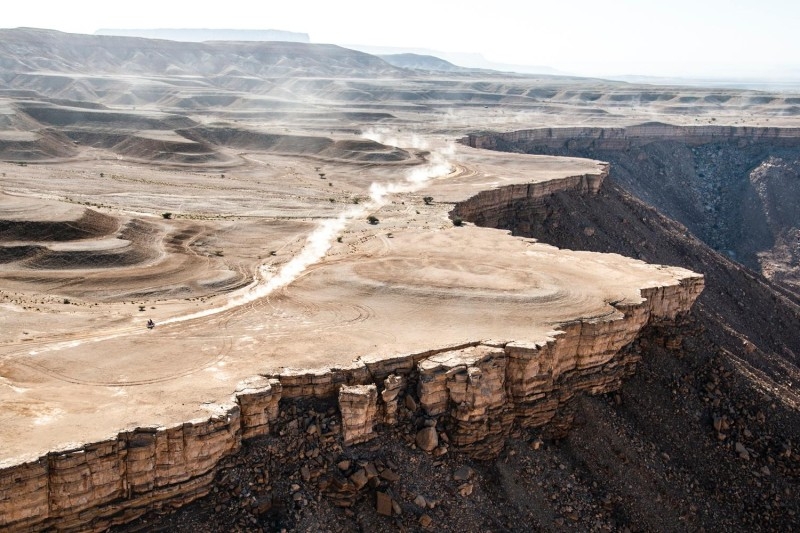 A Rallyist speeds past a scenic stage nine of the Dakar Rally on Tuesday, won by Frenchman Stephane Peterhansel.