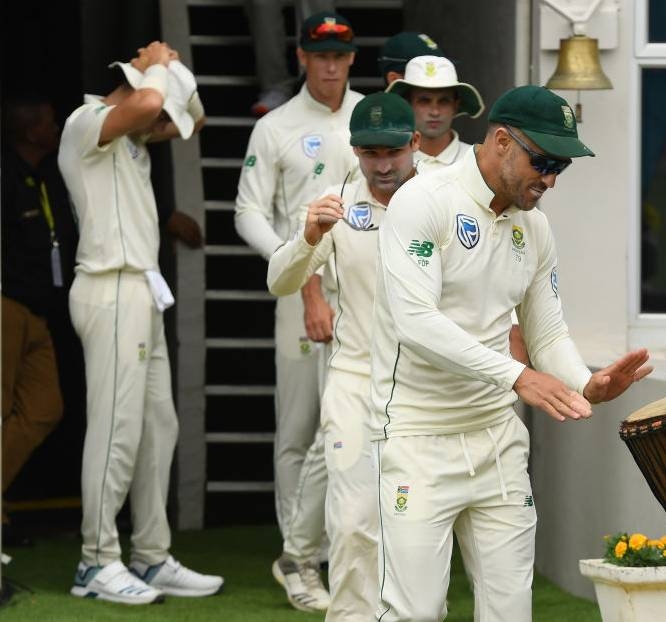 South African captain Faf du Plessis, who has been out of form in recent months, is seen leading the side to the ground in Port Elizabeth,