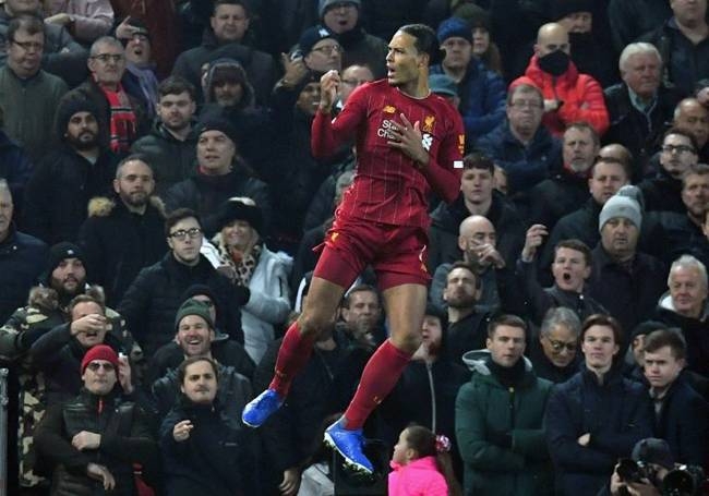 Head and shoulders above the rest: Virgil van Dijk has led Liverpool to a 16-point Premier League lead. — AFP
