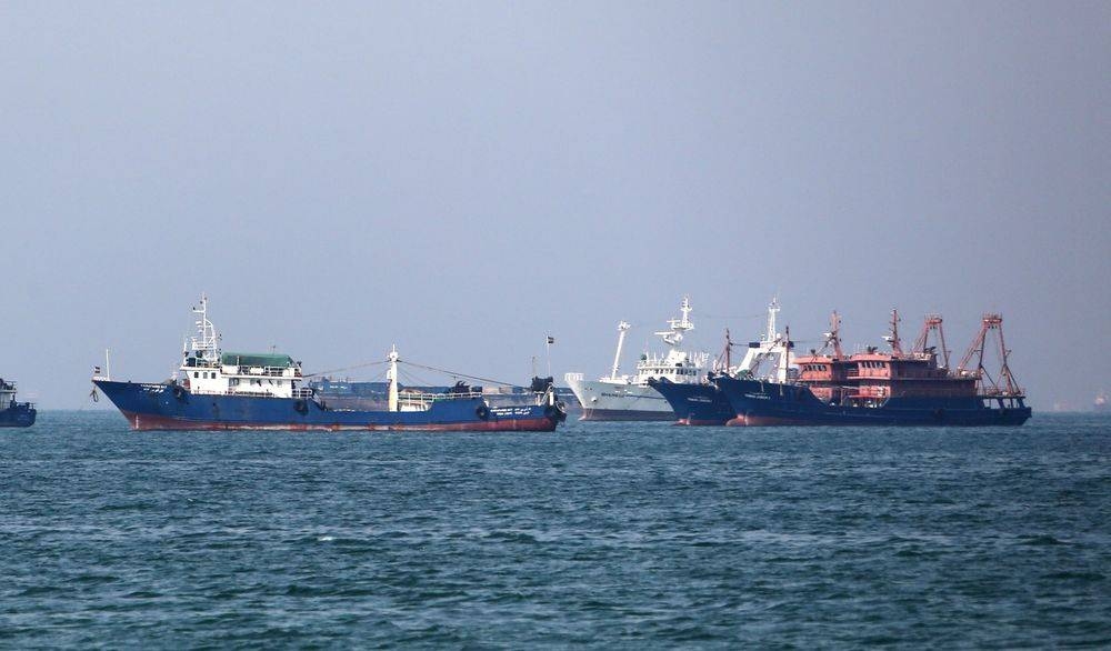 Cargo ships are seen in the Strait of Hormuz in this file photo. — AFP