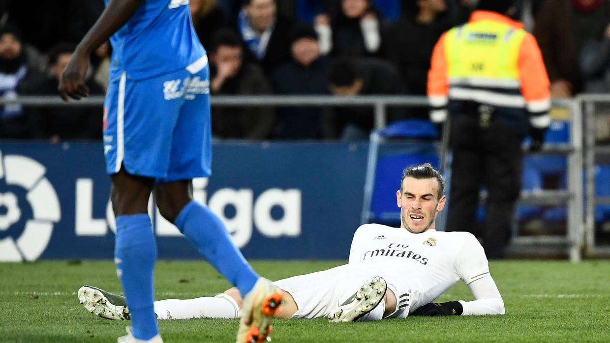 Real Madrid forward Gareth Bale is seen lying on the ground in this file photo. — AFP