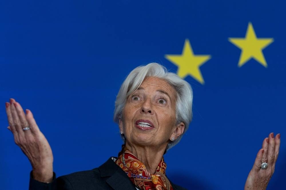 European Central Bank president Christine Lagarde was slightly more upbeat Thursday about risks to the eurozone economy, and insisted climate change would be central to a rethink of the institution's goals and methods.