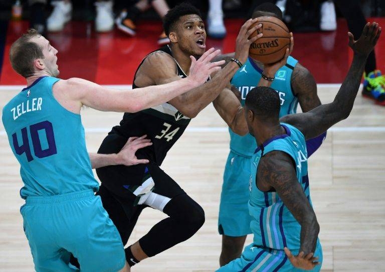 NBA Milwaukee Bucks forward Giannis Antetokounmpo drives toward the basket in the first ever NBA regular season game in Paris on Friday. — AFP