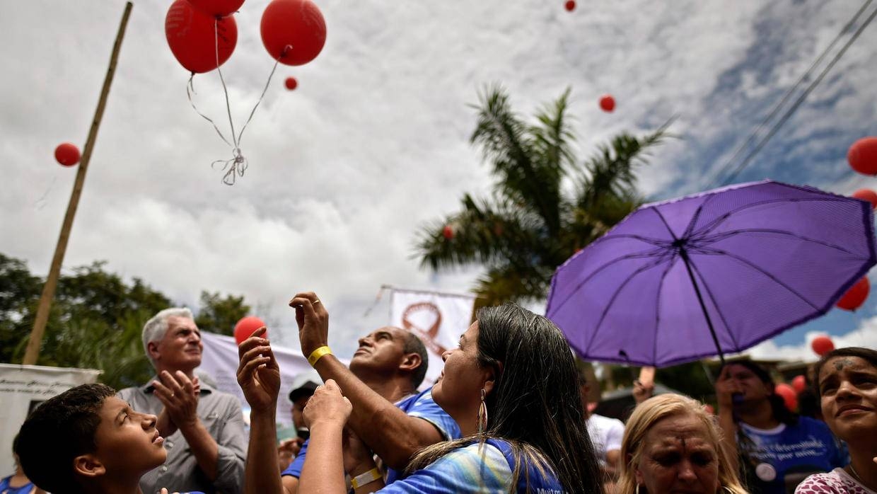 Mourners in Brumadinho, Brazil, released red balloons in memory of the 270 people killed following a massive dam breach on Saturday. — AFP 