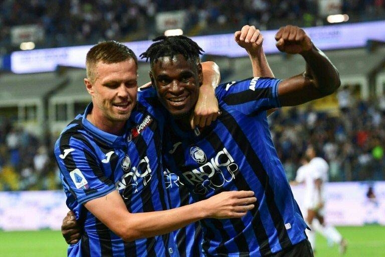 Atalanta's Josip Ilicic, left, and Duvan Zapata both scored in seven-goal rout of Torino. — AFP