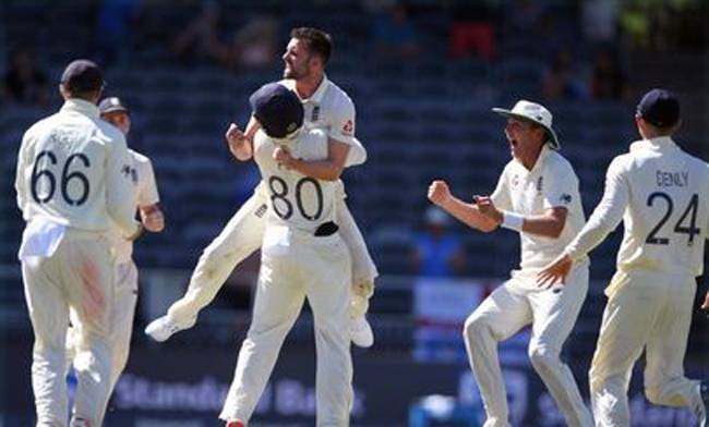 England players celebrate after completing a 3-1 series victory with a 191-run win in the fourth and final Test against South Africa at the Wanderers Stadium on Monday.