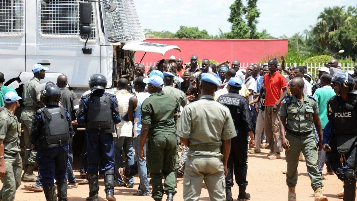 Central African Republic police officers face demonstrators in Bangui, Central African Republic, in this May 11, 2015 file photo. — AFP 