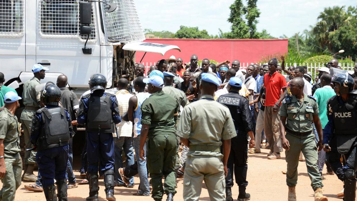 Central African Republic police officers face demonstrators in Bangui, Central African Republic, in this May 11, 2015 file photo. — AFP 