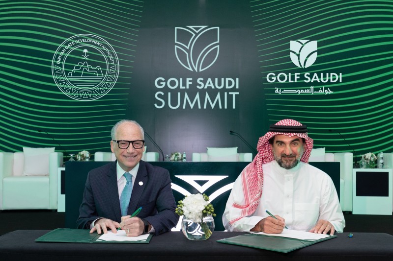 Yasir Al-Rumayyan, chairman of Golf Saudi, and Jerry Inzerillo, CEO of DGDA, signing the MoU in King Abdullah Economic City (KAEC) on Tuesday. — Courtesy photo