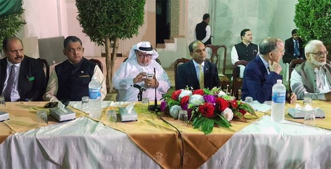 Chief guest Dr. Ali Al-Ghamdi at the event. On his left is Consul General Khalid Majid. — Photo by Syed Mussarat Khalil)