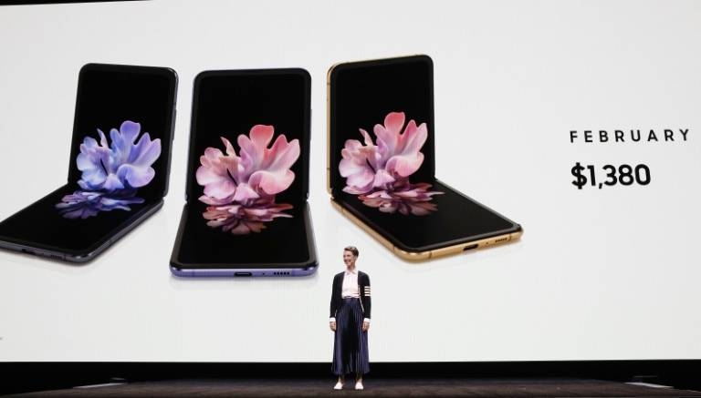 Rebecca Hirst, Samsung marketing director, unveils the Samsung's Galaxy Z Flip folding smartphone in San Francisco, California, on Tuesday. — AFP