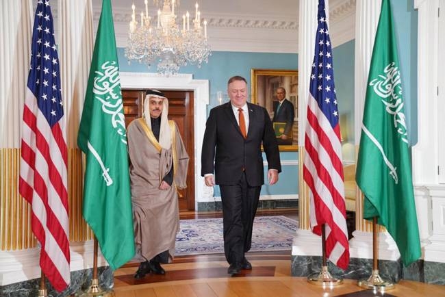 Minister of Foreign Affairs Prince Faisal Bin Farhan shakes hands with US Secretary of State Mike Pompeo at the State Department headquarters in Washington on Wednesday. — SPA