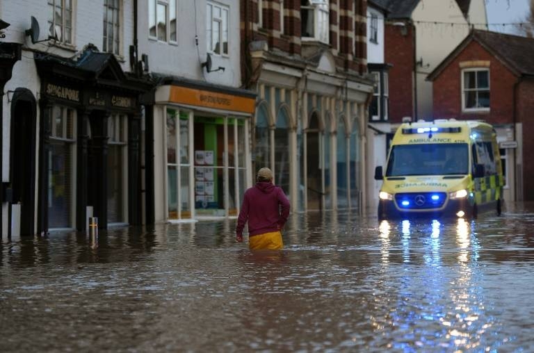 A record 594 flood warnings and alerts were in place Storm Dennis swept across Britain. — AFP