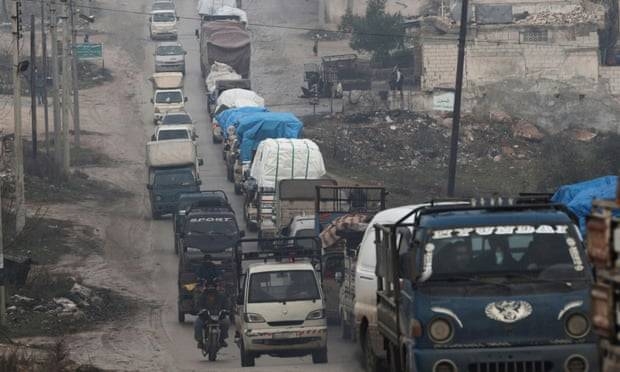 Trucks carrying belongings of displaced Syrians in northern Idlib. — Courtesy photo