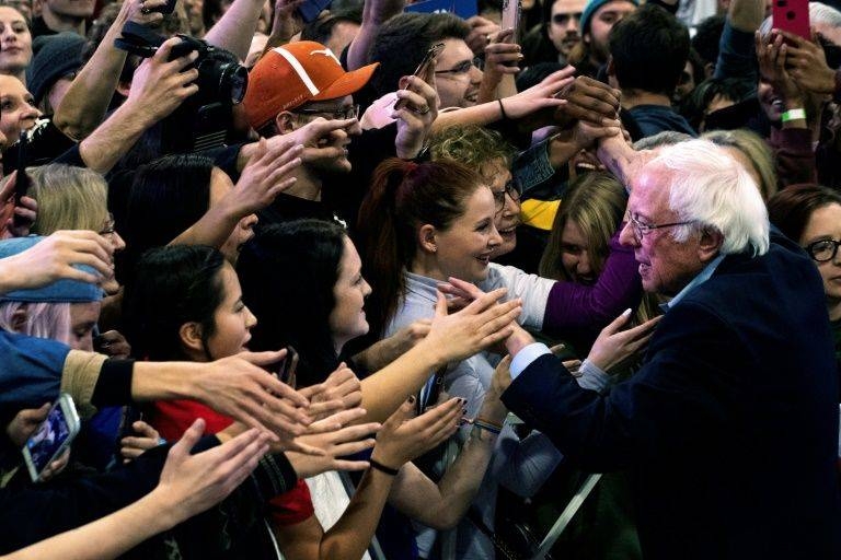 Democratic presidential candidate Vermont Senator Bernie Sanders greets supporters after a campaign rally in Denver, Colorado, in this Feb. 16, 2020. — AFP