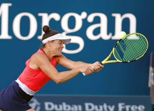 Qualifier Jennifer Brady claimed a second seeded victim Thursday, defeating Garbine Muguruza to reach the Dubai Championships semifinals.