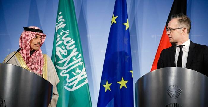Foreign Minister Prince Faisal Bin Farhan, left, and German foreign Minister Heiko Maas address a pres conference in Berlin