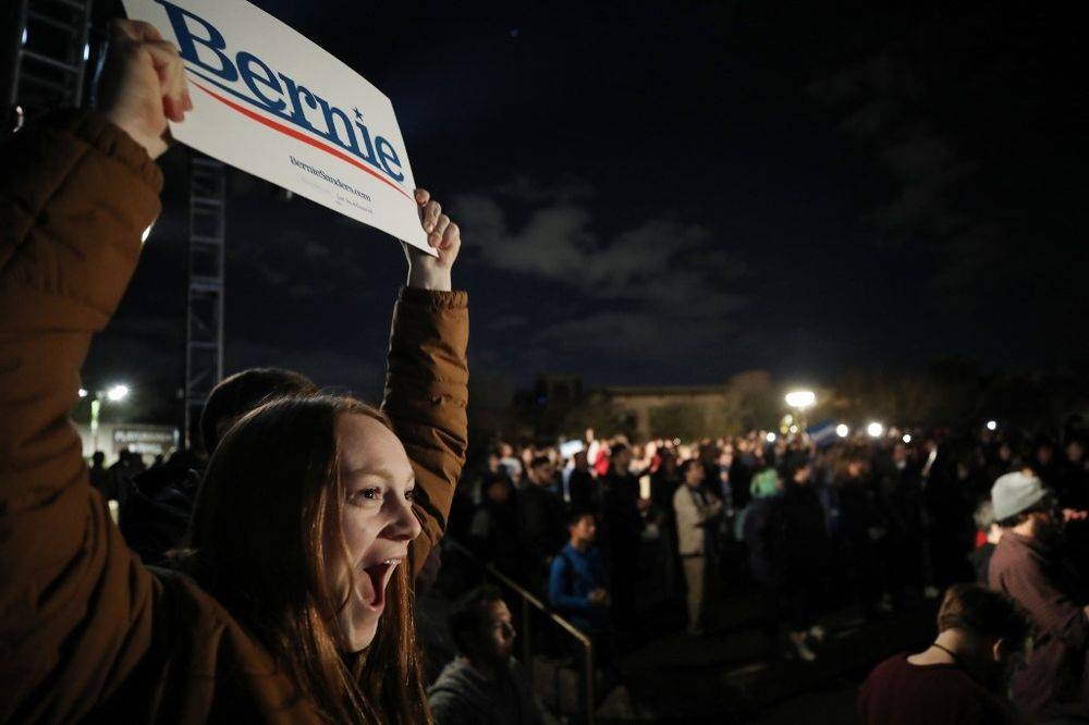 Supporters of Democratic presidential candidate Senator Bernie Sanders gather at a campaign rally for Sanders in Las Vegas, Nevada, on Friday. — AFP 