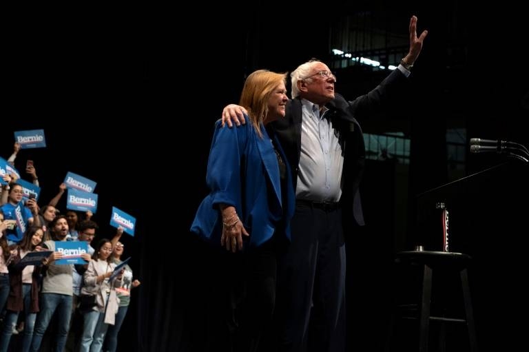 Leftist Bernie Sanders, seen with his wife Jane Sanders, claimed a major victory in Nevada's Democratic caucuses. — AFP