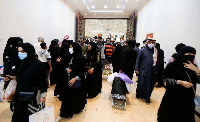 Locals wear facemasks to take precautions from coronavirus as they shop at the Bahrain's Autumn Fair 2020, in Manama. — Courtesy photo