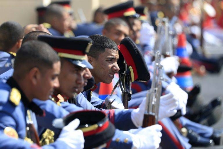 Honor guards wait as they attend Mubarak's funeral.