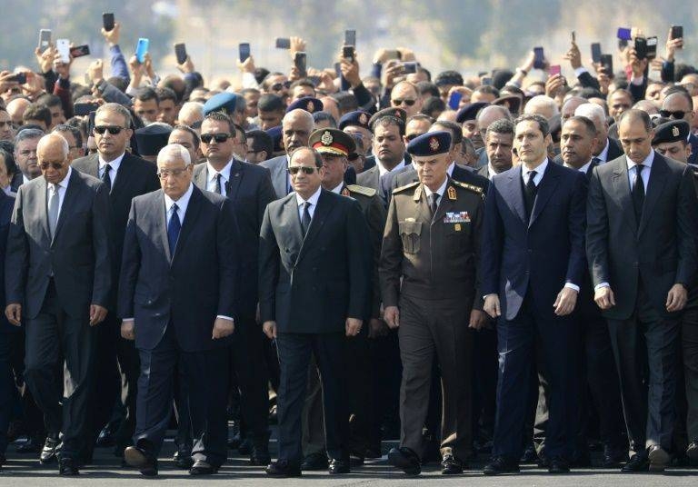 Honor guards wait as they attend Mubarak's funeral.