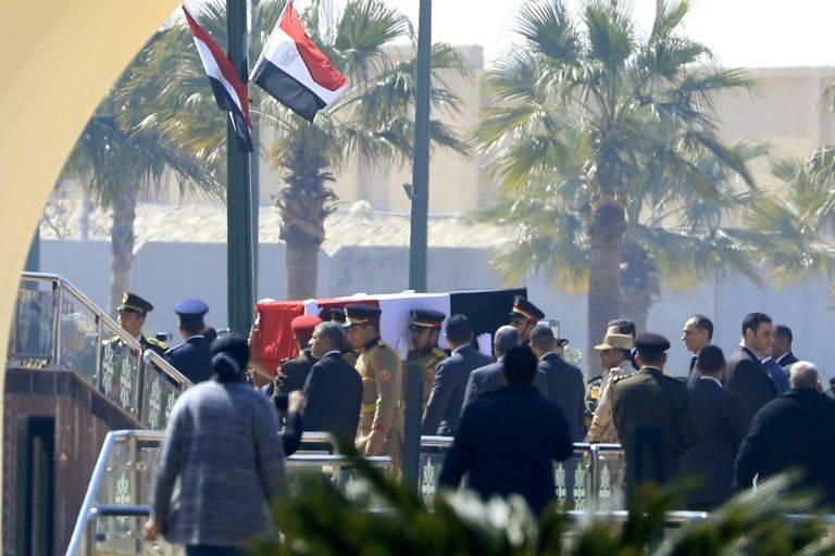 Honor guards wait as they attend Mubarak's funeral.